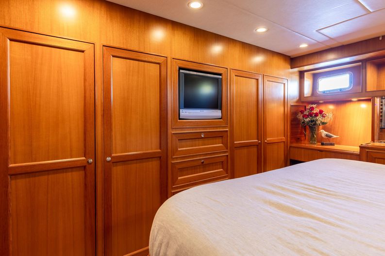Sunshine Yacht Photos Pics Offshore 72 Sunshine - Master Stateroom,TV and Hanging Storage